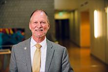 image of Dean Kevin Ball standing in the Human Health Building